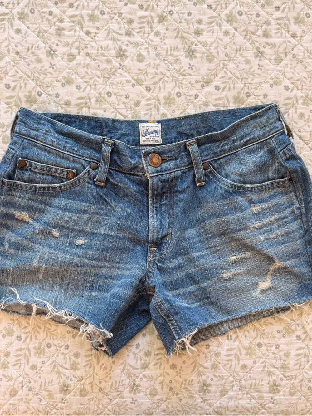 Vintage MOUSSY blue denim mini shorts with frayed hem